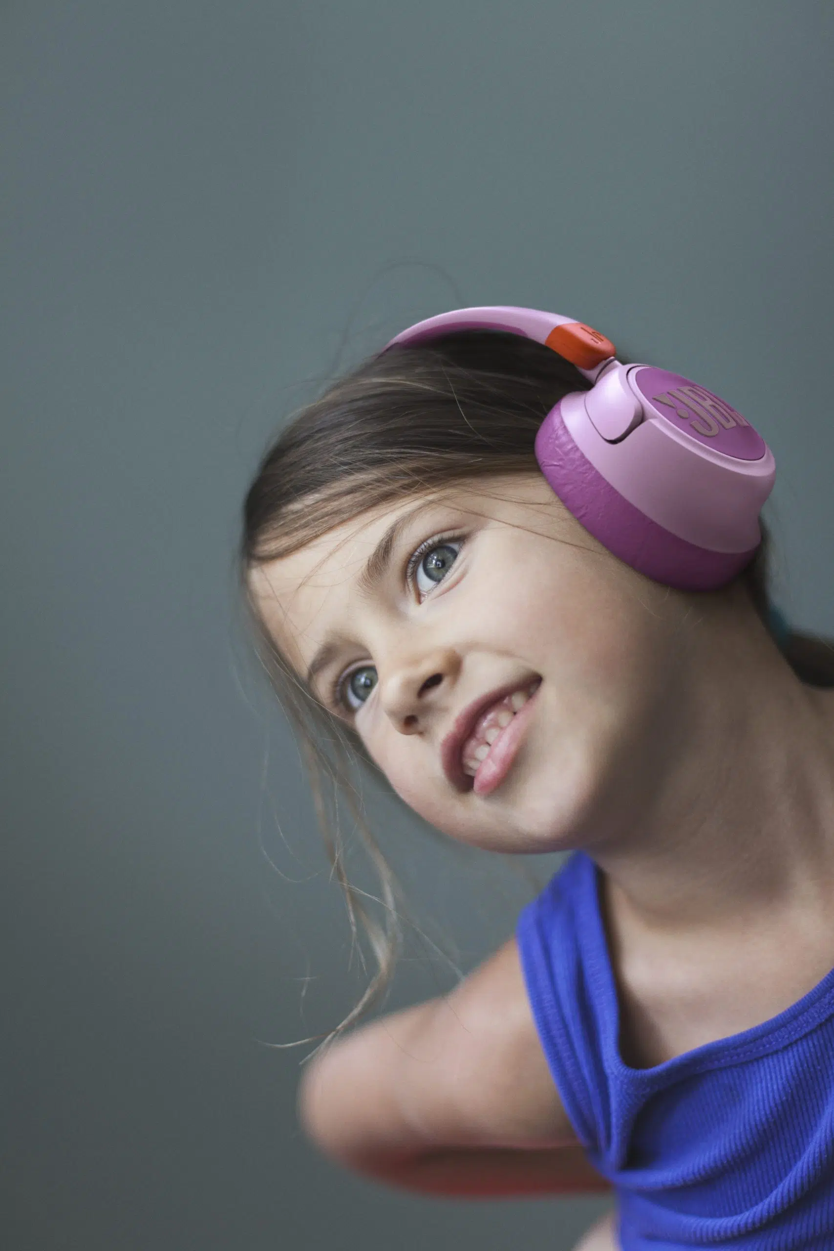 Simple Portrait Of A Girl Smiling Indoors